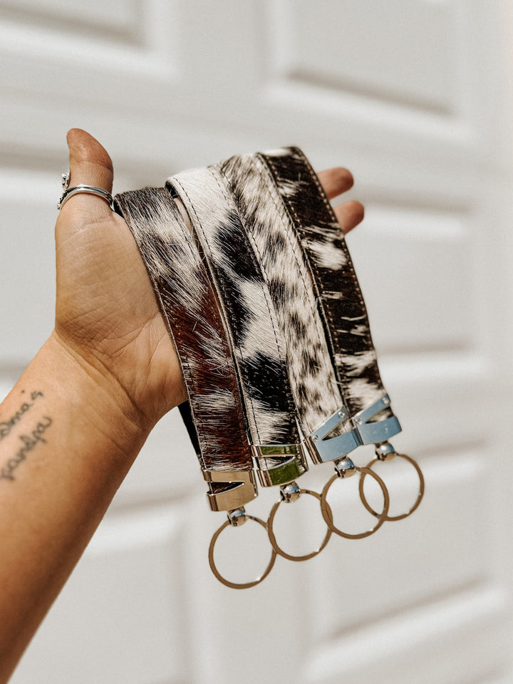 Mooving On Cowhide Wristlet