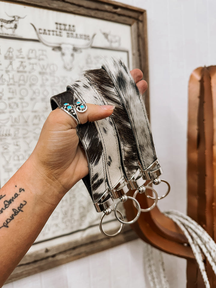 Mooving On Cowhide Wristlet