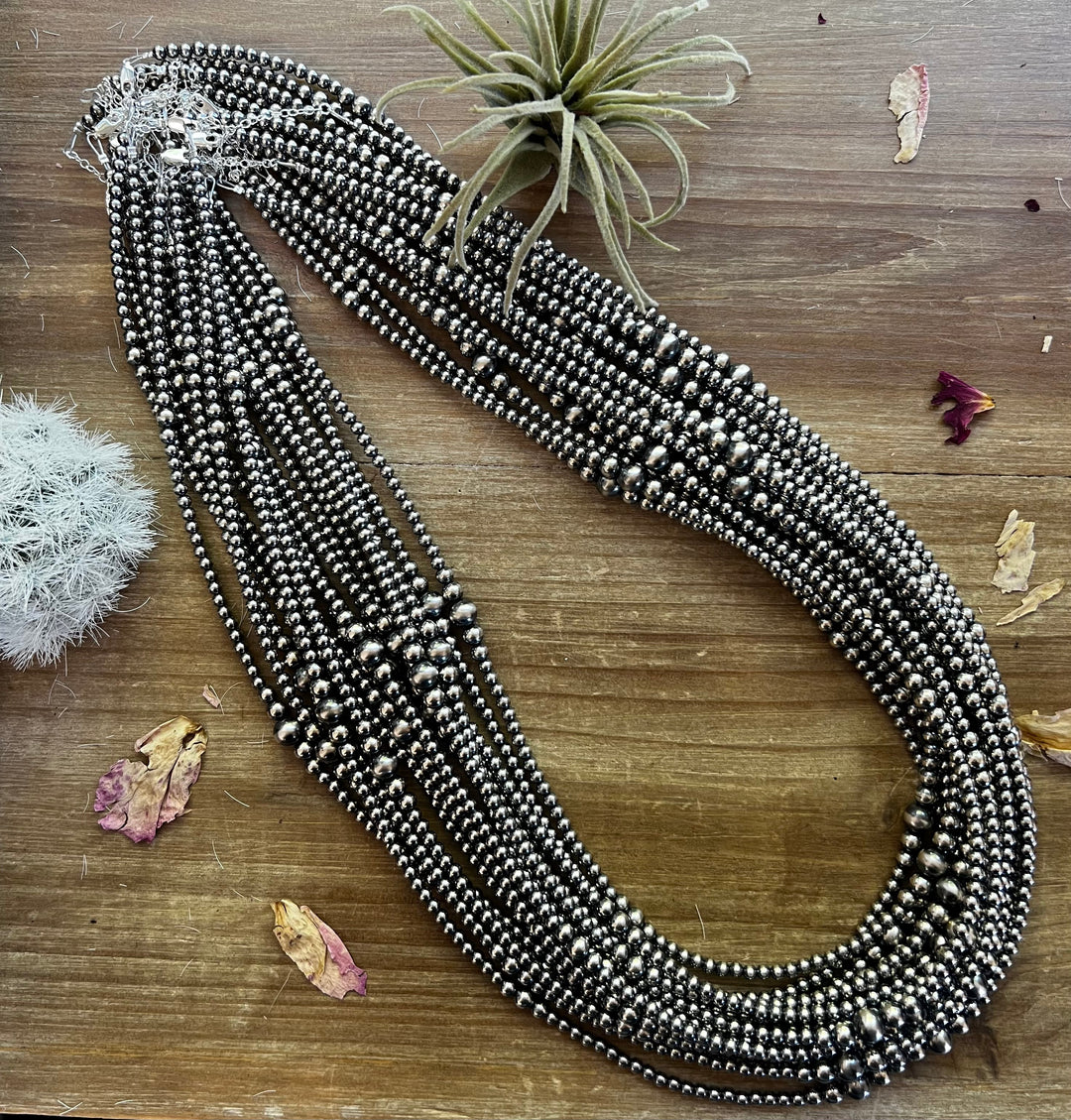 Graduated Silver Pearl Necklace - 28” - 4 through 8 mm